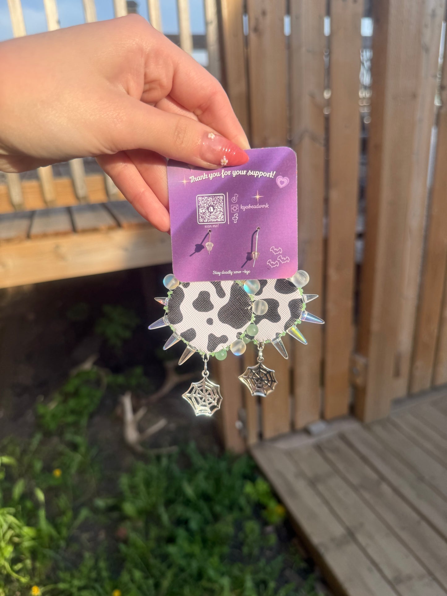 Green spiked Beaded Earrings With Spider Web Charms
