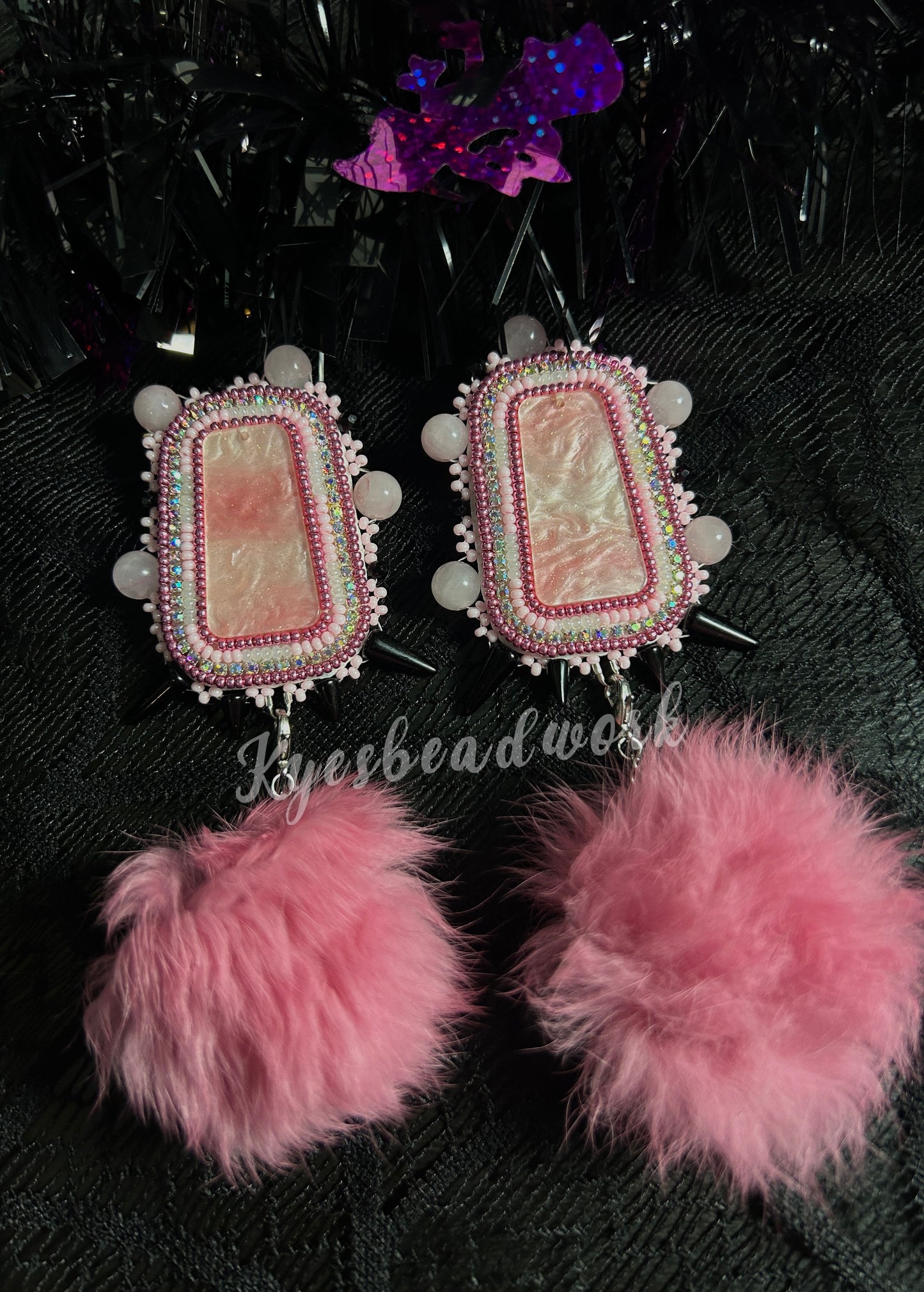 Pink Spiked Earrings With Poms