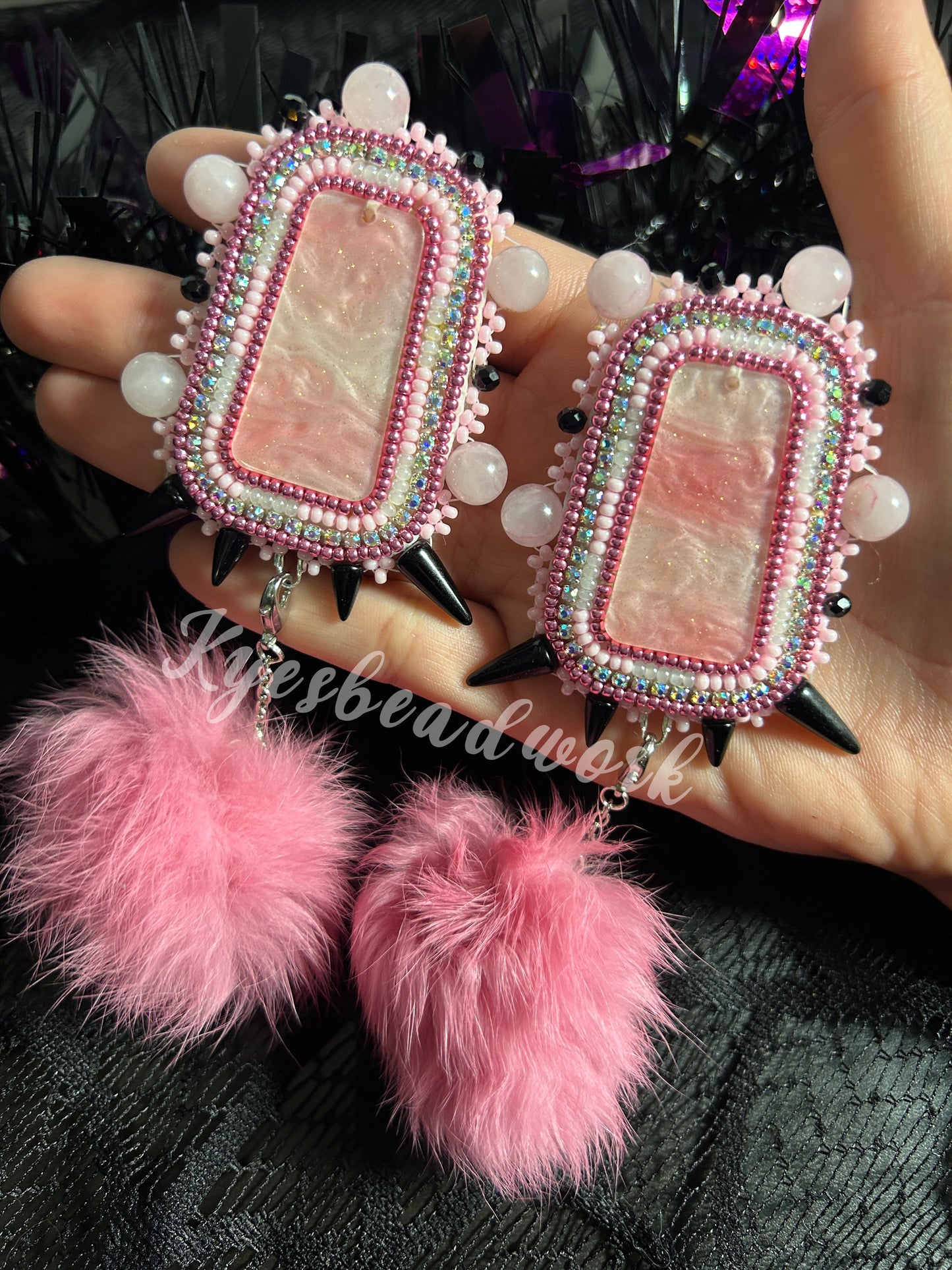 Pink Spiked Earrings With Poms