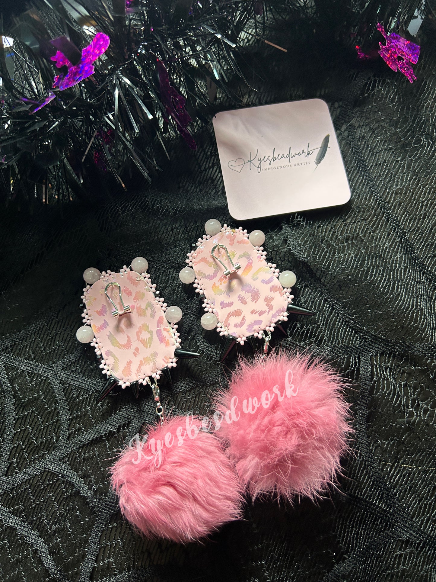 Pink Spiked Earrings With Poms