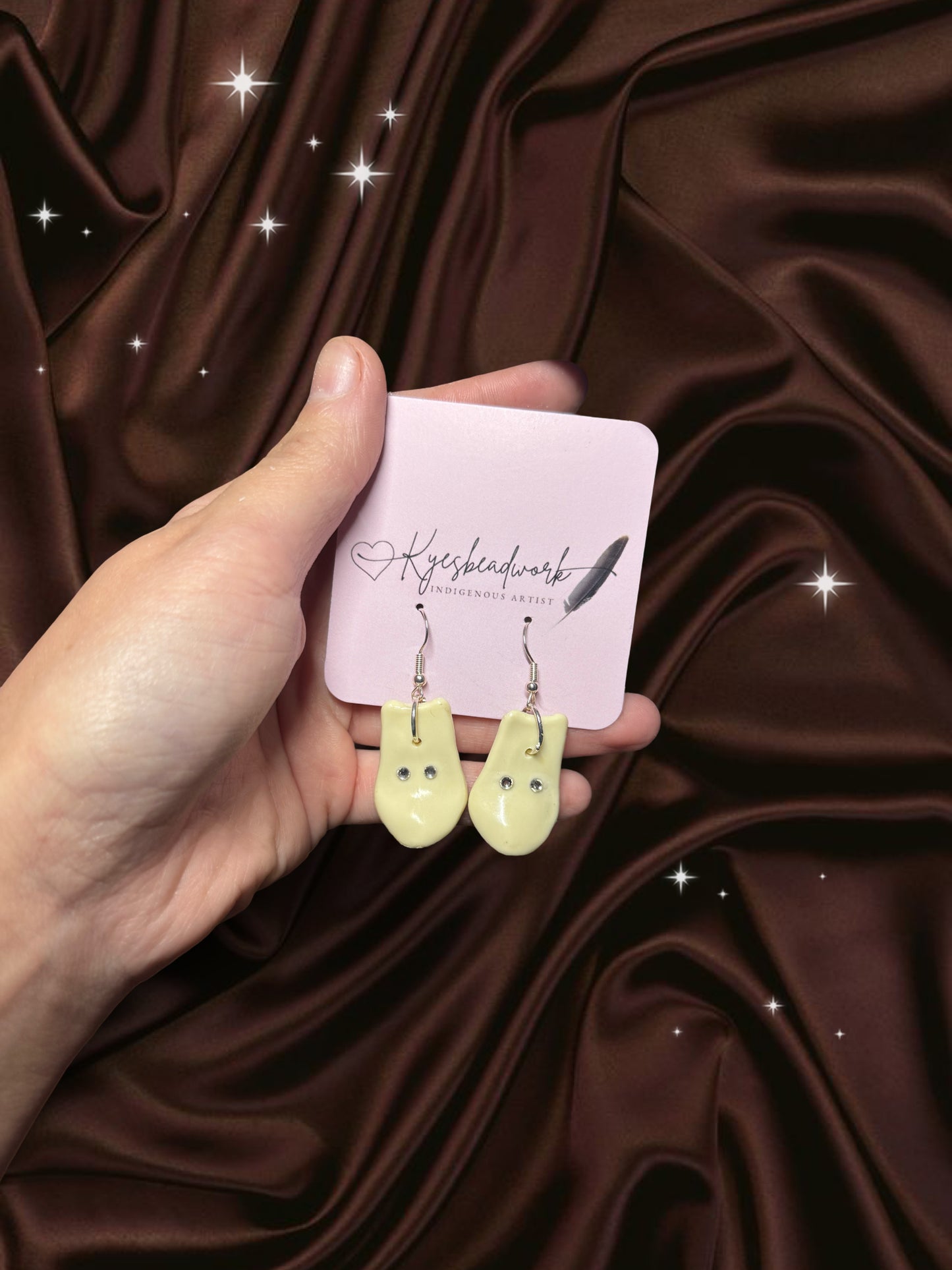 Elk teeth imitation earrings with bling